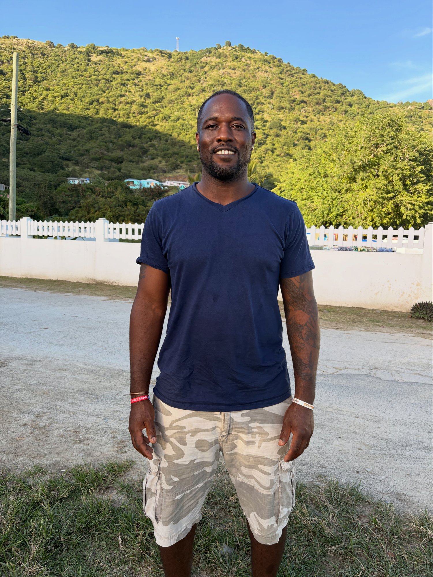 Lion Spirit founder practicing tai chi on the beach at Jost Van Dyke